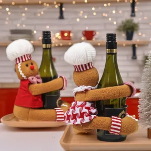 Charming gingerbread man and girl wine bottle covers for Christmas table decoration
