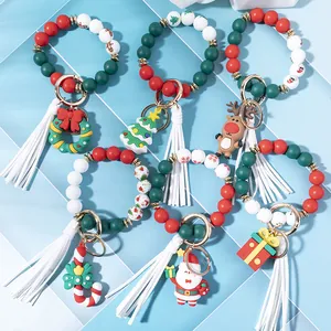 Weihnachts-Armband-Schlüsselanhänger aus Silikonperlen mit festlichen Anhängern