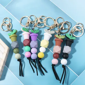 Bunter Silikonperlen-Schlüsselanhänger mit Mini-Sukkulenten-Anhänger und schwarzer Quaste