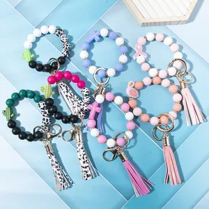 Food grade silicone bead bracelet keychain with leopard print tassels and charms