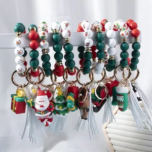 Weihnachts Schlüsselanhänger aus Silikonperlen mit Nikolaus, Elch und Quaste Anhängern