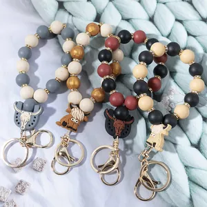 Colorful silicone rainbow beaded wristlet keychain with stylish cow head charm pendant