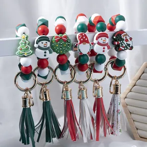 Christmas silicone bead keychain set with festive charms and matching leather tassels