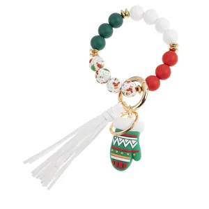 Detailansicht der Weihnachts-Silikonperlen-Schlüsselanhänger mit Quaste und Handschuh