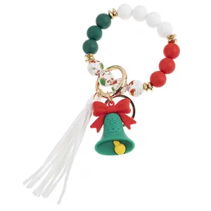 Detailsicht des Weihnachts-Silikonperlen-Schlüsselanhängers mit festlichen Mustern und Glocke