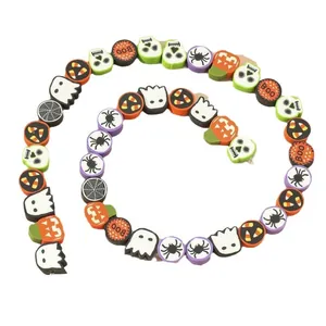 Colorful Halloween polymer clay beads set with pumpkin, ghost, and skull patterns