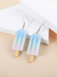 Macro shot of macaron gradient popsicle earrings with resin wood sticks for summer