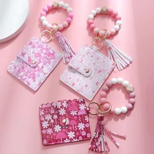 Silicone beaded wristlet keychain with PU leather card wallet and stylish tassel charm
