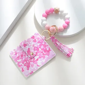 Silicone beaded wristlet keychain with heart print PU leather card holder and tassel