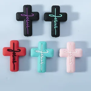 Πέντε σταυροί σιλικόνης με επιγραφή Jesus για χάντρες οδοντοφυΐας σε διάφορα χρώματα