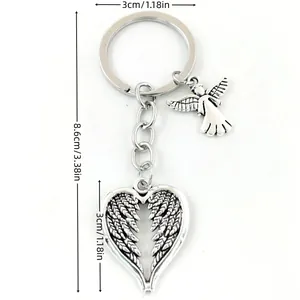Guardian angel heart wing keychain in antique silver finish with detailed feathers