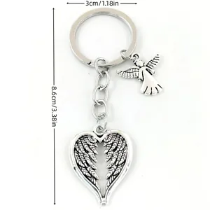 Guardian angel heart wing keychain in vintage silver alloy finish with dimensions
