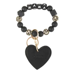 Black beaded wristlet keychain with leopard print accents and heart MAMA charm