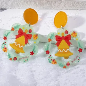 Christmas acrylic earrings featuring Santa and reindeer motifs in festive colors