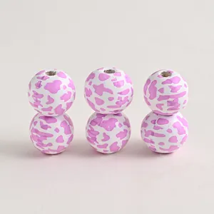 Farm-themed pink cow print round wooden beads for DIY jewelry and tassel craft accessories