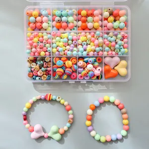 DIY jewelry making kit with pastel beads, alphabet beads, and charms in a 12-grid storage box