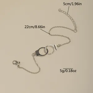Detail of silver handcuff anklet with FREEDOM engraving showing 22cm plus 5cm length