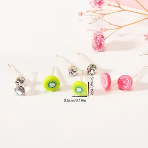 Macro detail of 0.5cm mixed fruit and flower resin stud earrings set for children