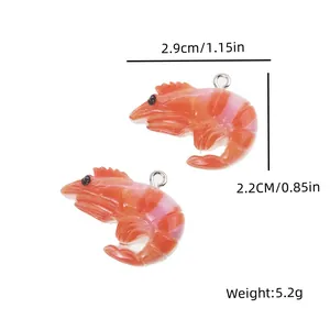 Detailed view of shrimp charm pendant with metal ring showing dimensions 2.9cm x 2.2cm