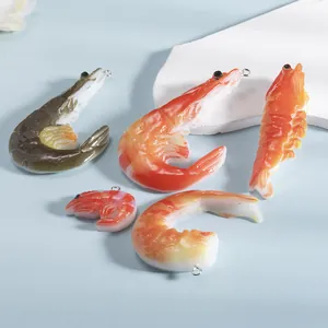 Set of creative realistic shrimp pendants in raw and cooked colors for DIY jewelry making