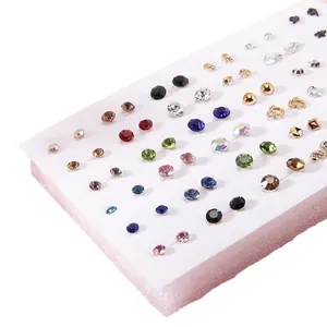36 pairs of colorful resin fruit and rhinestone stud earrings set on a white display card