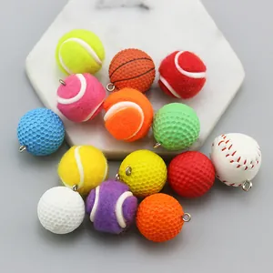 Macro view of assorted mini sports ball pendants including tennis, golf and baseball