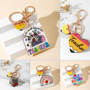Wooden printed teacher gift keychains with pencil and rainbow charms in various designs