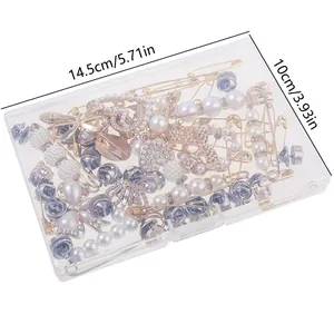 Plastic storage box containing decorative bow charms and pins, sized 14.5cm x 10cm