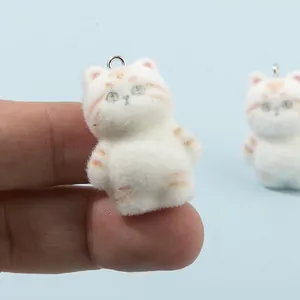 White flocked cat charm with orange stripes and metal ring for DIY keychain crafts