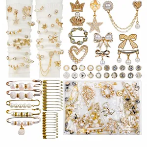55-piece DIY accessory set with golden metal bows, pearls and rhinestones for decoration