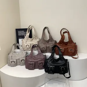Retro PU leather tote bags in six colors displayed on a minimalist white platform
