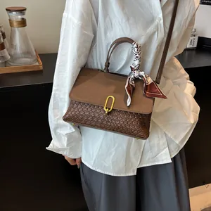Vintage brown woven handbag with silk scarf handle and golden buckle for women