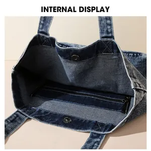 Detailansicht der Denim-Tasche mit Magnetverschluss und Innentasche mit Reißverschluss