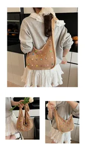 Detail of hand-woven tote bag with colorful pearl beads and soft knit texture