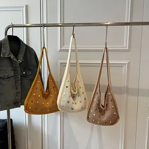 Chic woven tote bags with colorful pearls in yellow, white, and coffee knitted textures