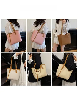 Three-color contrasting tote bag shown in multiple angles on a model in a studio setting