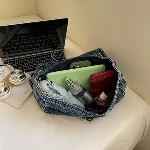 Vintage denim tote bag showing spacious interior with umbrella, tablet and daily essentials