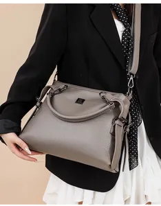 Litchi texture grey leather tote bag detail with gunmetal hardware and strap