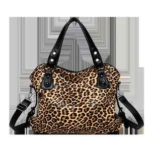 Large leopard print tote bag with black handles and detachable shoulder strap for women