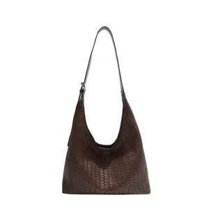 Minimalist deep brown woven leather hobo shoulder bag with adjustable strap