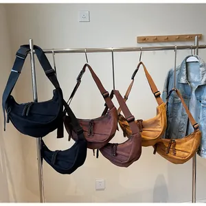 Japanese style nylon crescent crossbody bags in black brown and yellow with wide straps