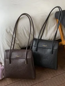 Retro large capacity tote bags in black and brown pebbled leather with gold stamping