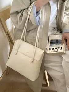 Minimalist cream white flap shoulder bag with retro bead straps and leather texture