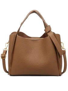 Brown lychee texture bucket bag with top handle and adjustable shoulder strap