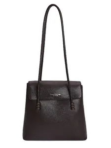 Large dark brown leather bucket bag with litchi texture and minimalist shoulder straps