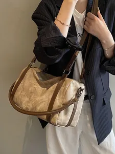 Retro beige large capacity cylinder bag with brown leather trim and shoulder strap for women