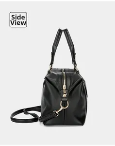 Side view of black lychee grain tote bag with gold hardware and detachable strap