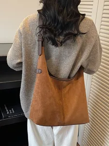 Brown leopard minimalist oversized suede hobo bag with adjustable leather shoulder strap