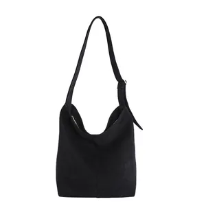 Minimalist black velvet hobo shoulder bag with adjustable strap for women in 2025 style