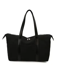 Bolso tote minimalista de lona negra de gran capacidad con asas de cuero y cremalleras plateadas